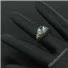 Image 4 : Antique Art Deco 18kt White Gold Round Aquamarine Solitaire Floral Filigree Ring