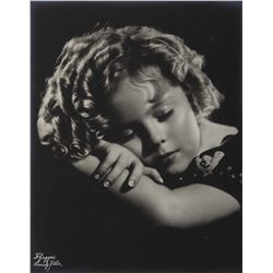 Collection of (4) Shirley Temple framed studio portraits.