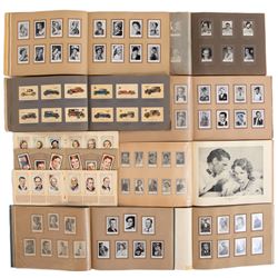 Large collection of (14) albums containing 100s of vintage cigarette cards.