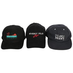 Collection of (37) baseball caps and hats from Barry Sonnenfeld productions.