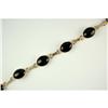 Image 1 : 14K GOLD BRACELET BLACK ONYX 24 CARATS! (61308)