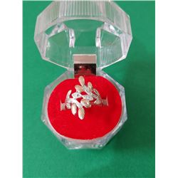 950 silver ring and 18 carat gold bath.