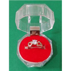 950 silver ring and 18 carat gold bath with zirconia.