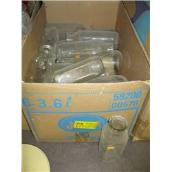 BOX OF GLASS MILK BOTTLES