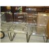 Image 1 : 4 CHROME & CLEAR PLASTIC CHAIRS