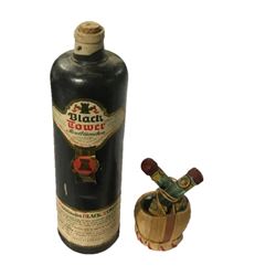 Vintage 1969 Black Tower German Stoneware Wine Bottle  & Liqueur bottle in basket