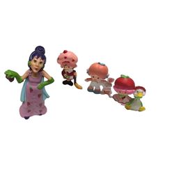 Strawberry Shortcake figurines, Sour Grapes Figurine, Carleton Cards bag, and Christmas Ornament