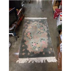 FRINGED AREA RUG