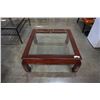Image 1 : MAHOGANY FINISH GLASSTOP COFFEE TABLE