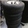 Image 1 : SET OF 4 YOKOHAMA TIRES 245/70R15 ON 5 BOLT RIMS