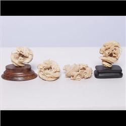 Four Dragons Carved from Cohiba Nuts