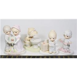 FOUR LARGE PRECIOUS MOMENTS FIGURINES