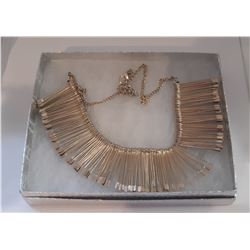 17)  GOLD TONE STATEMENT NECKLACE