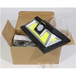 LOT OF 2 NEW SOLAR SECURITY LED LIGHTS