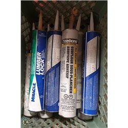 TOTE OF LUMBER LOCK FLOOR ADHESIVE TUBES