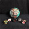 Image 1 : ASSORTED HOCKEY PUCKS/  GRIZZLIES BASKETBALL LOT