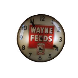 "Wayne Feeds"  Electric ad clock  15" d