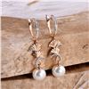 Image 4 : A 14KT ROSE GOLD AND PEARL & DIAMONDS EARRING.