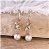 Image 6 : A 14KT ROSE GOLD AND PEARL & DIAMONDS EARRING.