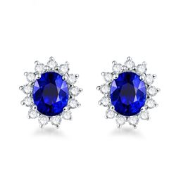 A 14KT WHITE GOLD AND SAPPHIRE & DIAMONDS EARRING.