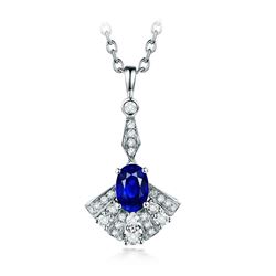 A 14KT WHITE GOLD AND SAPPHIRE & DIAMONDS PENDANT.