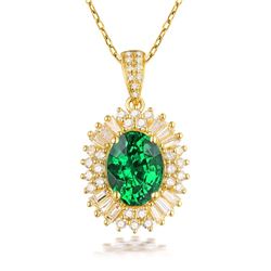 A 18KT YELLOW GOLD AND EMERALD & DIAMONDS PENDANT.