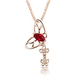 A 14KT ROSE GOLD AND RUBY & DIAMONDS PENDANT.