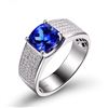 Image 1 : A 14KT WHITE GOLD AND TANZANITE & DIAMONDS MAN RING.