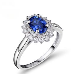 A 14KT WHITE GOLD AND SAPPHIRE & DIAMONDS RING.