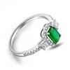 Image 2 : A 18KT WHITE GOLD AND EMERALD & DIAMONDS RING.