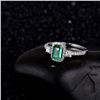 Image 3 : A 18KT WHITE GOLD AND EMERALD & DIAMONDS RING.