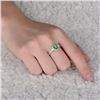 Image 6 : A 18KT WHITE GOLD AND EMERALD & DIAMONDS RING.