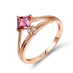 A 18KT ROSE GOLD AND TOURMALINE & DIAMONDS RING.