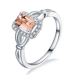 A 14KT WHITE GOLD AND MORGANITE & DIAMONDS RING.