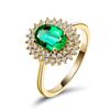 Image 1 : A 18KT YELLOW GOLD AND EMERALD & DIAMONDS RING.