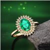 Image 3 : A 18KT YELLOW GOLD AND EMERALD & DIAMONDS RING.
