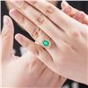 Image 6 : A 18KT YELLOW GOLD AND EMERALD & DIAMONDS RING.