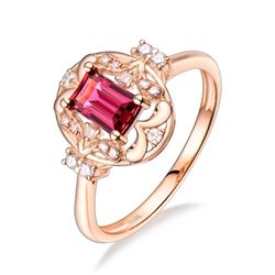 A 18KT ROSE GOLD AND TOURMALINE & DIAMONDS RING.