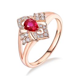 A 14KT ROSE GOLD AND RUBY & DIAMONDS RING.