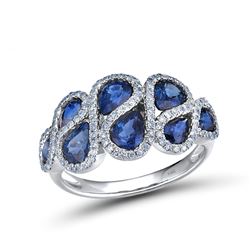 A 14KT WHITE GOLD AND SAPPHIRE & DIAMONDS RING.