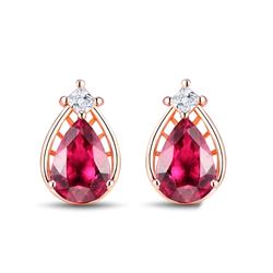 A 14KT ROSE GOLD AND TOURMALINE & DIAMOND EARRINGS.
