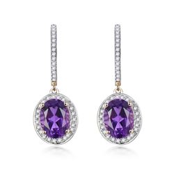 A 14KT YELLOW GOLD AND AMETHYST & DIAMONDS EARRINGS.