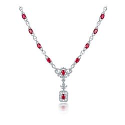 A 18KT WHITE GOLD AND RUBY & DIAMOND NECKLACE.