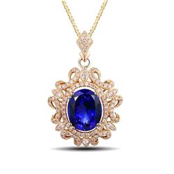 A 14KT YELLOW GOLD AND TANZANITE & DIAMONDS PENDANT.