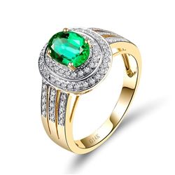 A 14KT YELLOW GOLD AND EMERALD & DIAMOND RING.