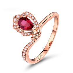 A 18KT ROSE GOLD AND RUBY & DIAMOND RING.