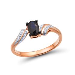 A 14KT ROSE GOLD AND SAPPHIRE & DIAMONDS RING.