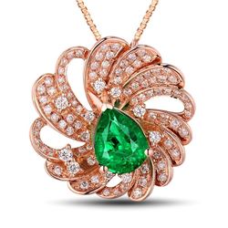 A 18KT ROSE GOLD AND EMERALD & DIAMONDS PENDANT.