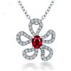 Image 1 : A 14KT WHITE GOLD AND RUBY & DIAMONDS PENDANT.