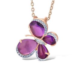 A 14KT ROSE GOLD AND AMETHYST & DIAMONDS PENDANT.
